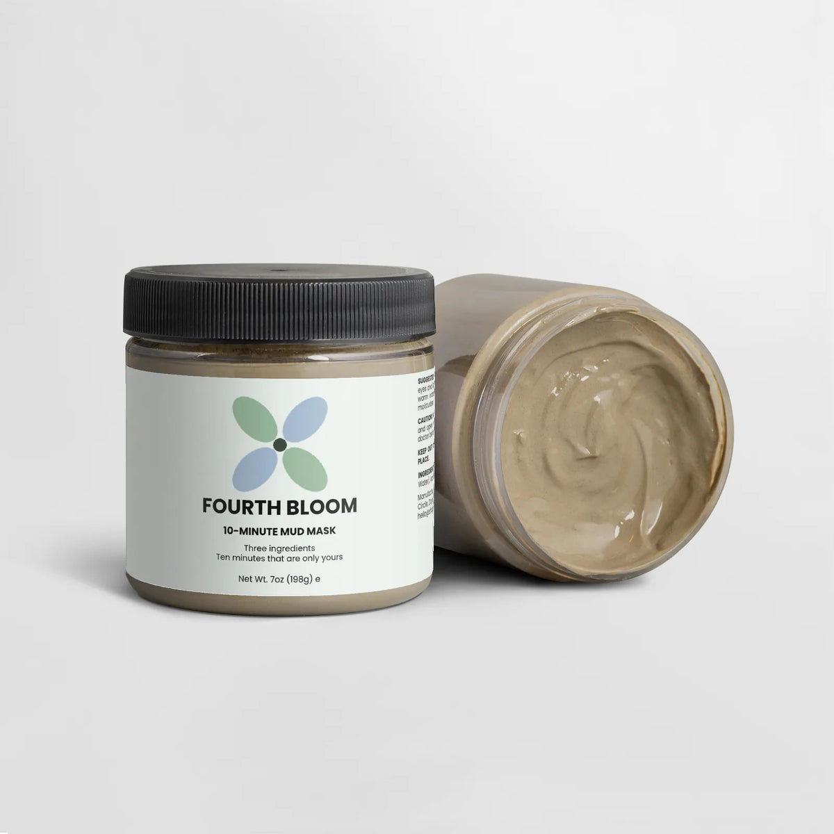 Fourth Bloom 10-Minute Mud Mask jars, 7 oz, one on its side
