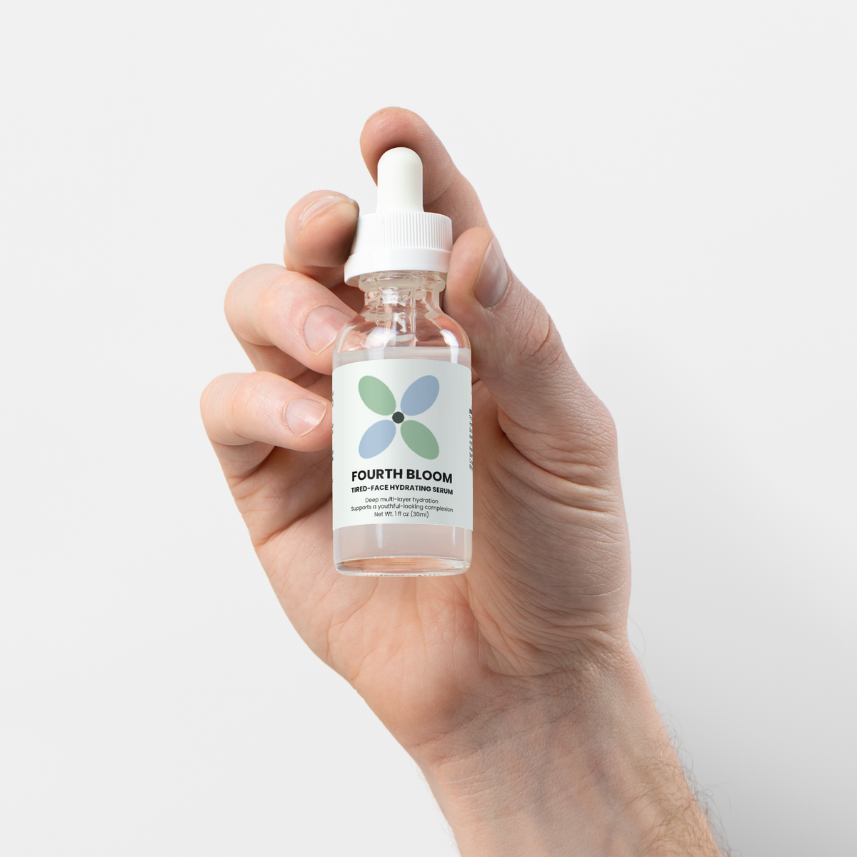 Fourth Bloom Tired-Face Hydrating Serum bottle, 1 fl oz, held in hand