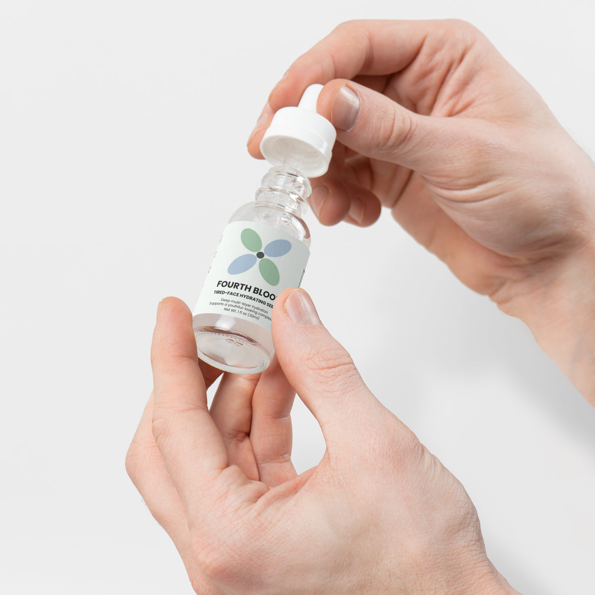 Fourth Bloom Tired-Face Hydrating Serum, dropper being lifted from bottle